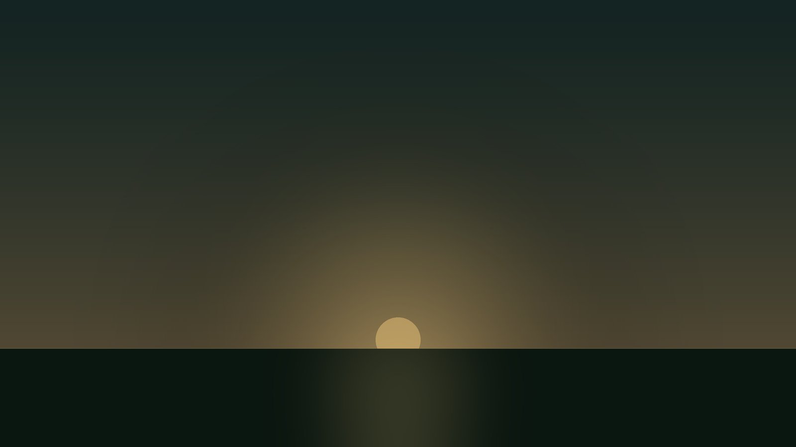 A low sun resting on a dark horizon, with light spreading above it